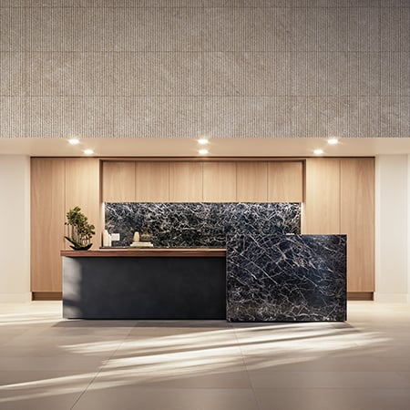 Building lobby entrance with dark features and mood lighting