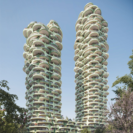 Bosa Properties' 1700 Alberni twin buildings with a green facade and a blue sky