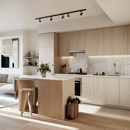 Solhouse's kitchen in a light colour scheme with sunlight coming in