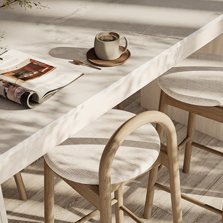 Kitchen counter with chairs among the shadows