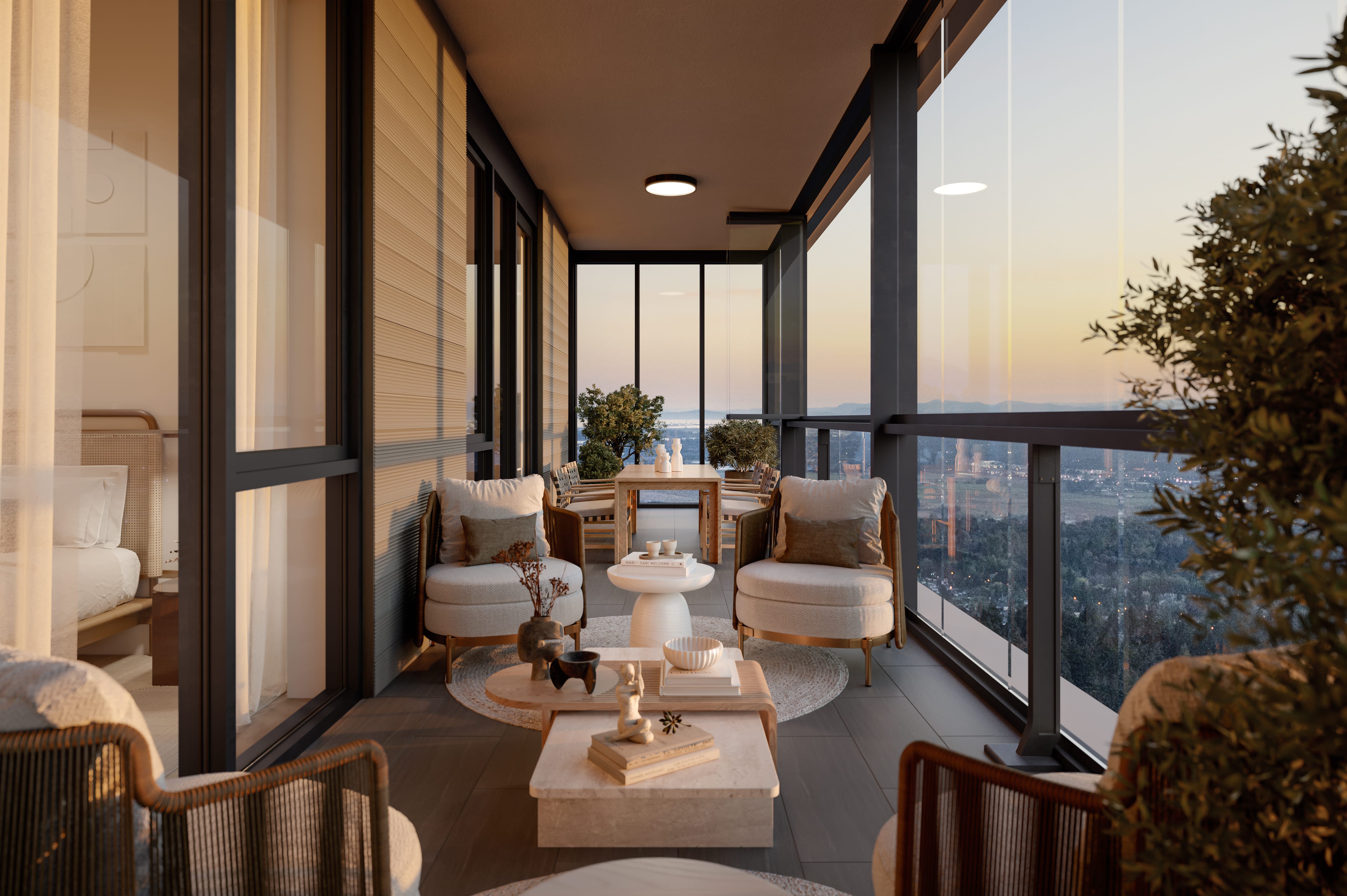 View from inside Lumon balcony with chairs and sunset