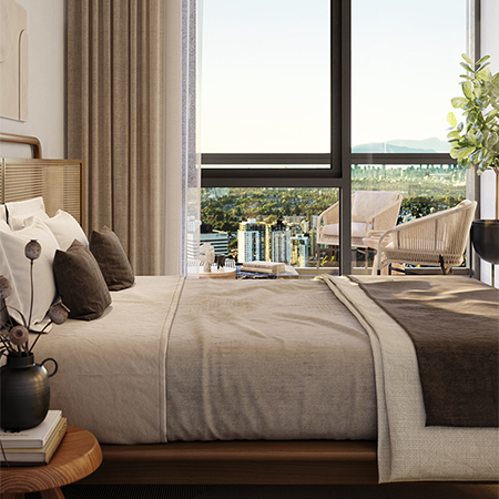 Bedroom overlooking greenery and blue skies