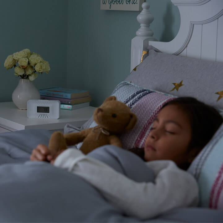 girl sleeping in bedroom 