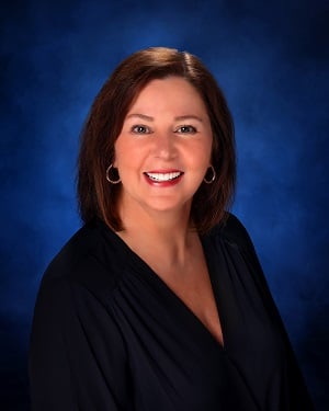 a woman smiling for the camera