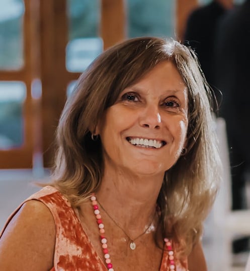 a woman smiling at the camera
