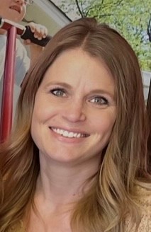 a woman smiling for the camera