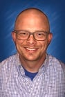 a man wearing glasses