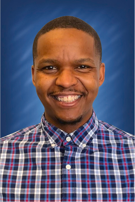 a man smiling for the camera