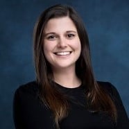 a woman smiling for the camera