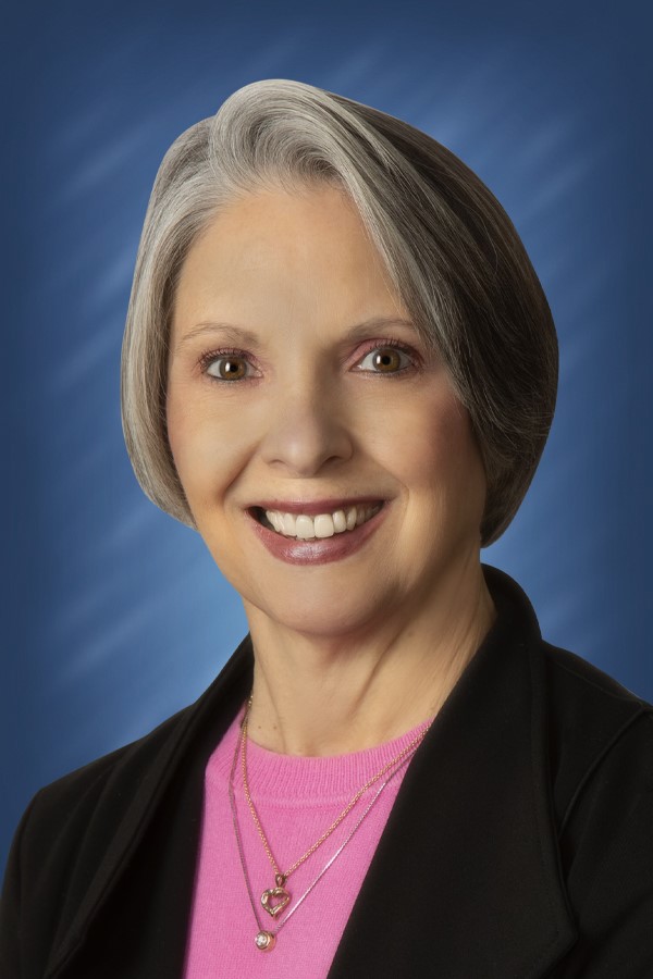 a person smiling for the camera