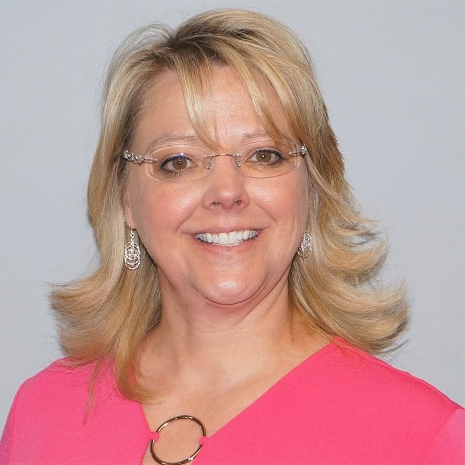 a woman wearing glasses
