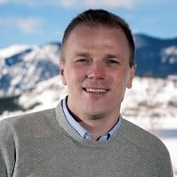 a man smiling for the camera