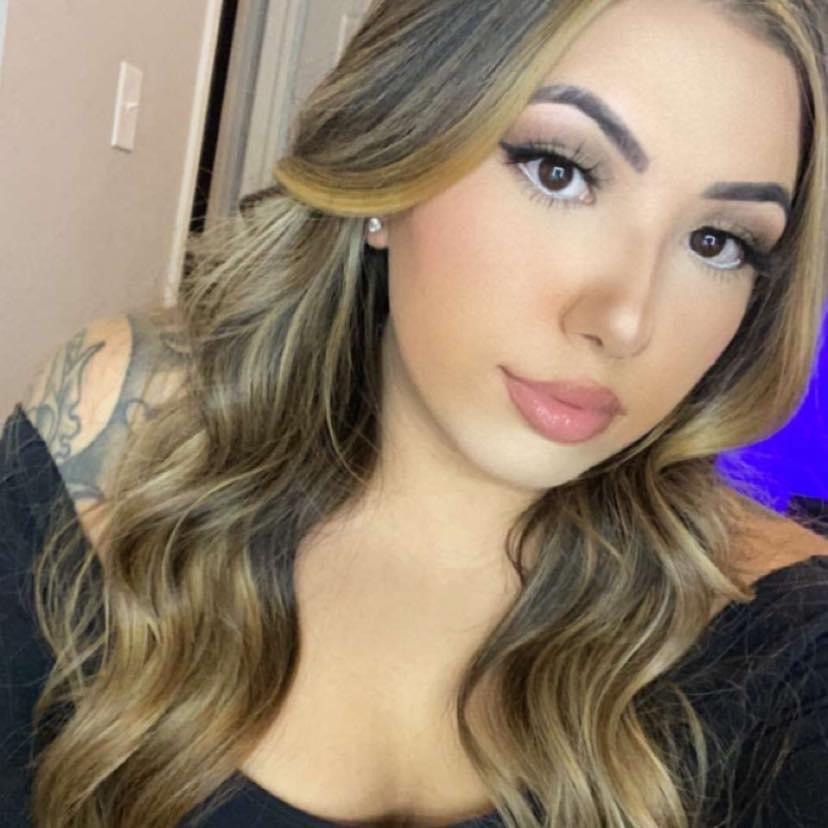 a woman taking a selfie