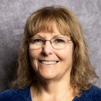 a close-up of a person smiling