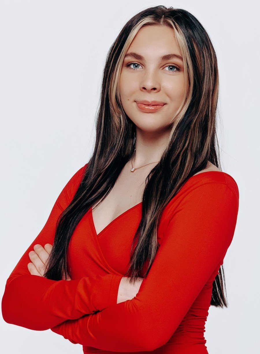 a woman in a red shirt