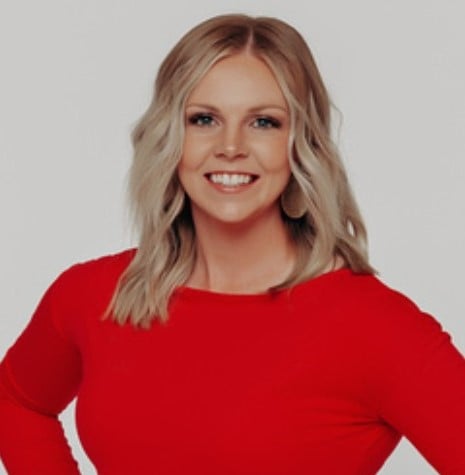 a woman in a red shirt