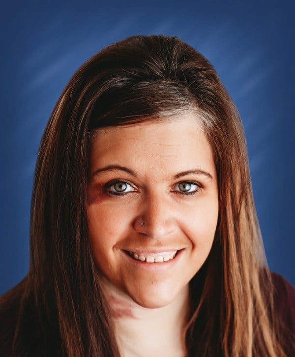 a close-up of a woman smiling