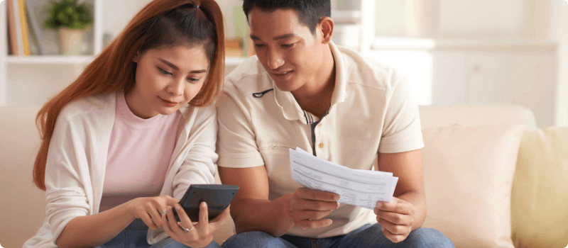 Couple reviewing their finances.