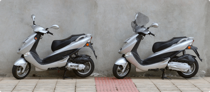 Two parked scooters. 