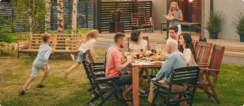 Friends and family enjoying dinner together. 