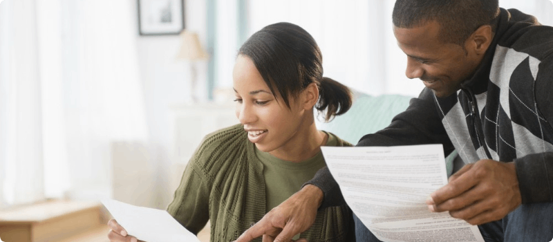 Couple reviewing documents.