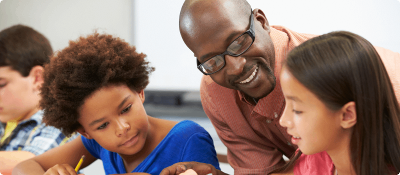 A tutor speaking to their students.