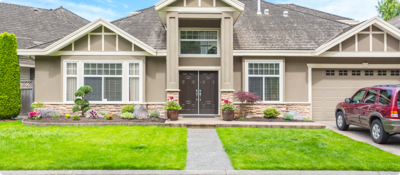 House with a trimmed lawn
