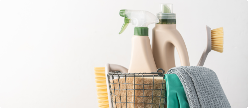 a basket of cleaning supplies