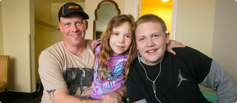 dad with daughter and son