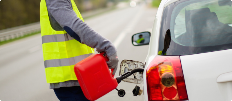 refilling a car's gas with a small fuel can