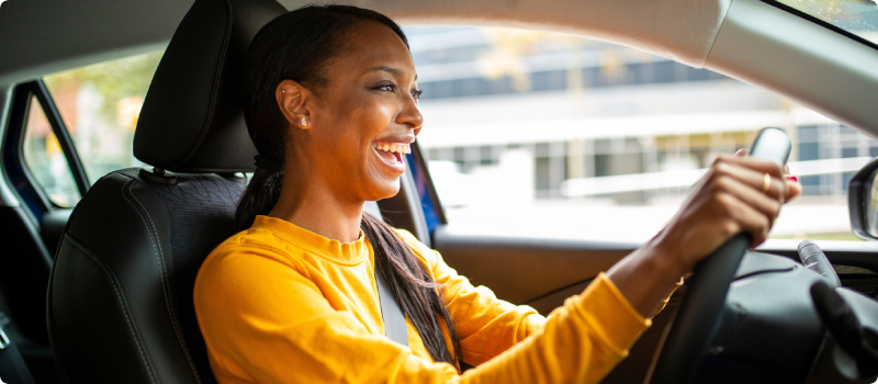 a woman driving a car