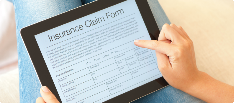 a tablet with an insurance claim form displayed on it