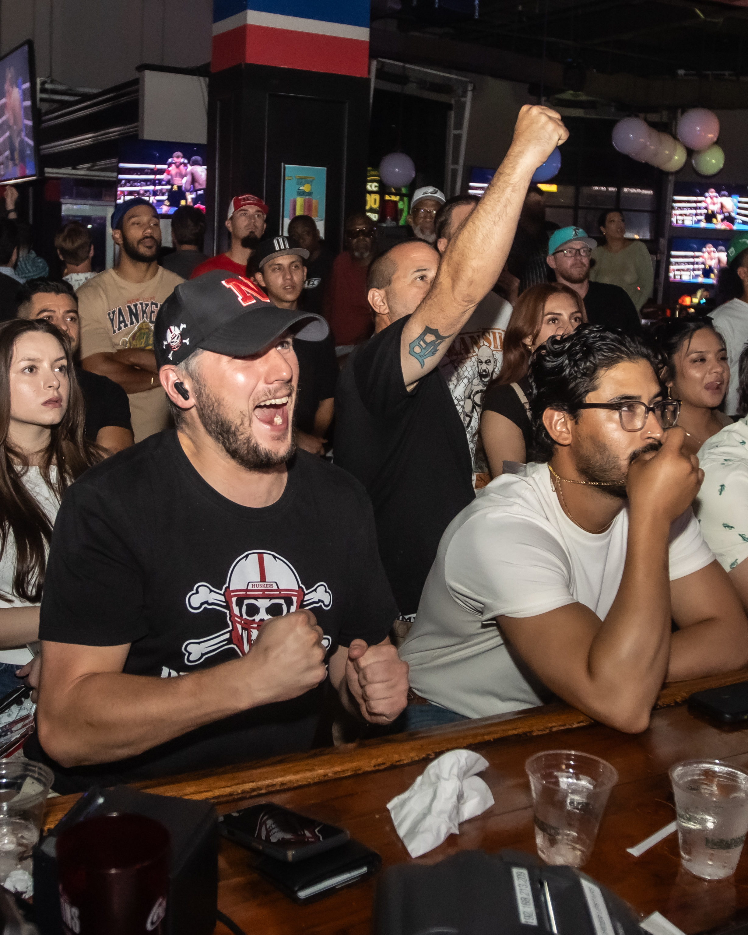 Crowd cheering at McFadden's Fight Night.