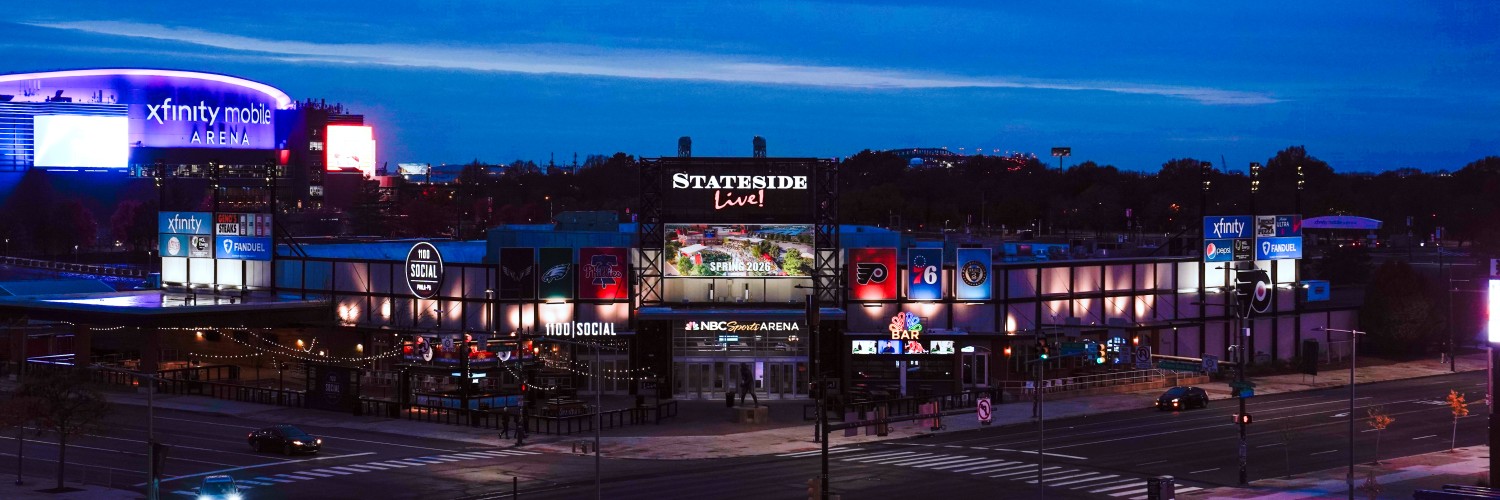 Stateside Live! exterior and surrounding area at night.