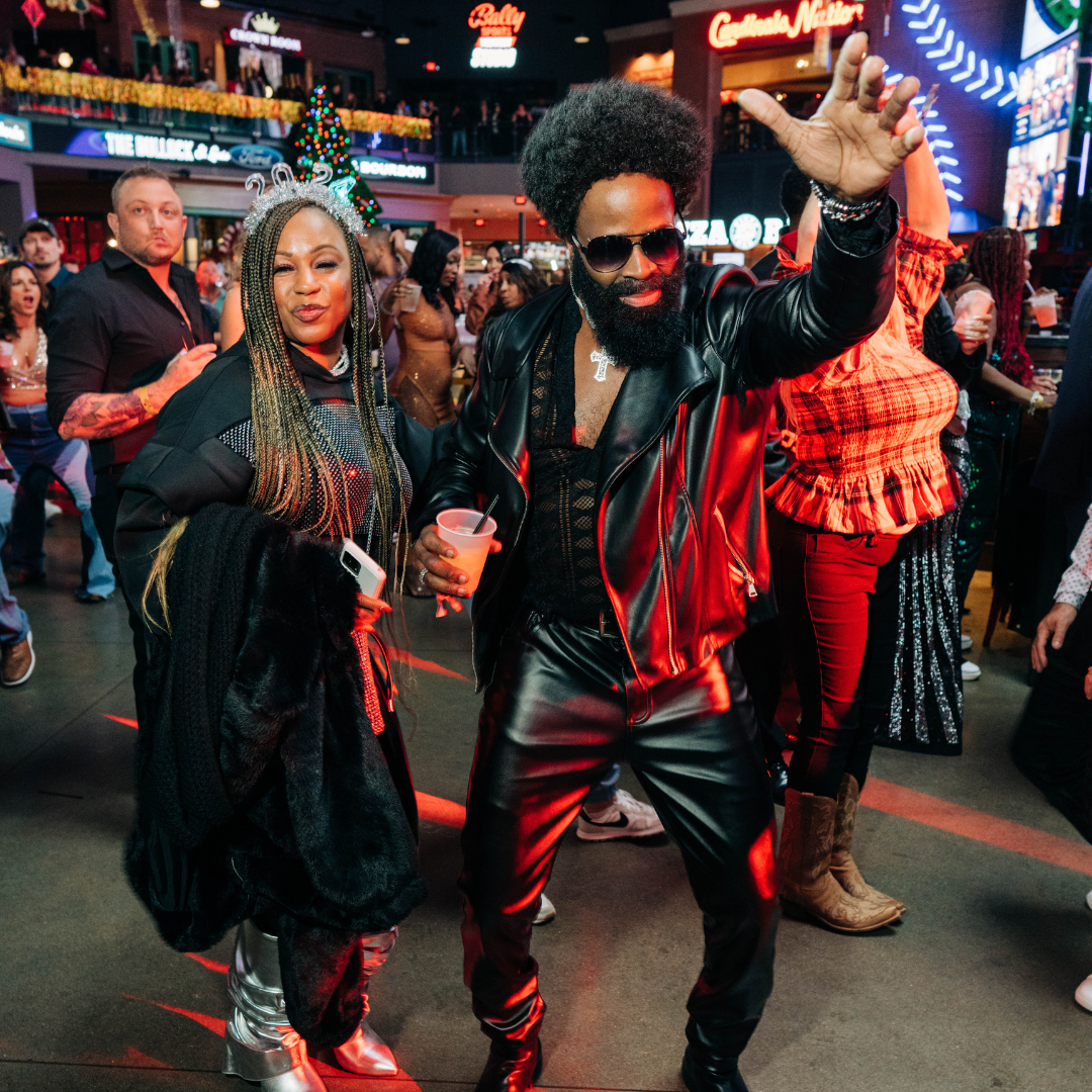 Couple dancing to live entertainment at New Year's Eve party