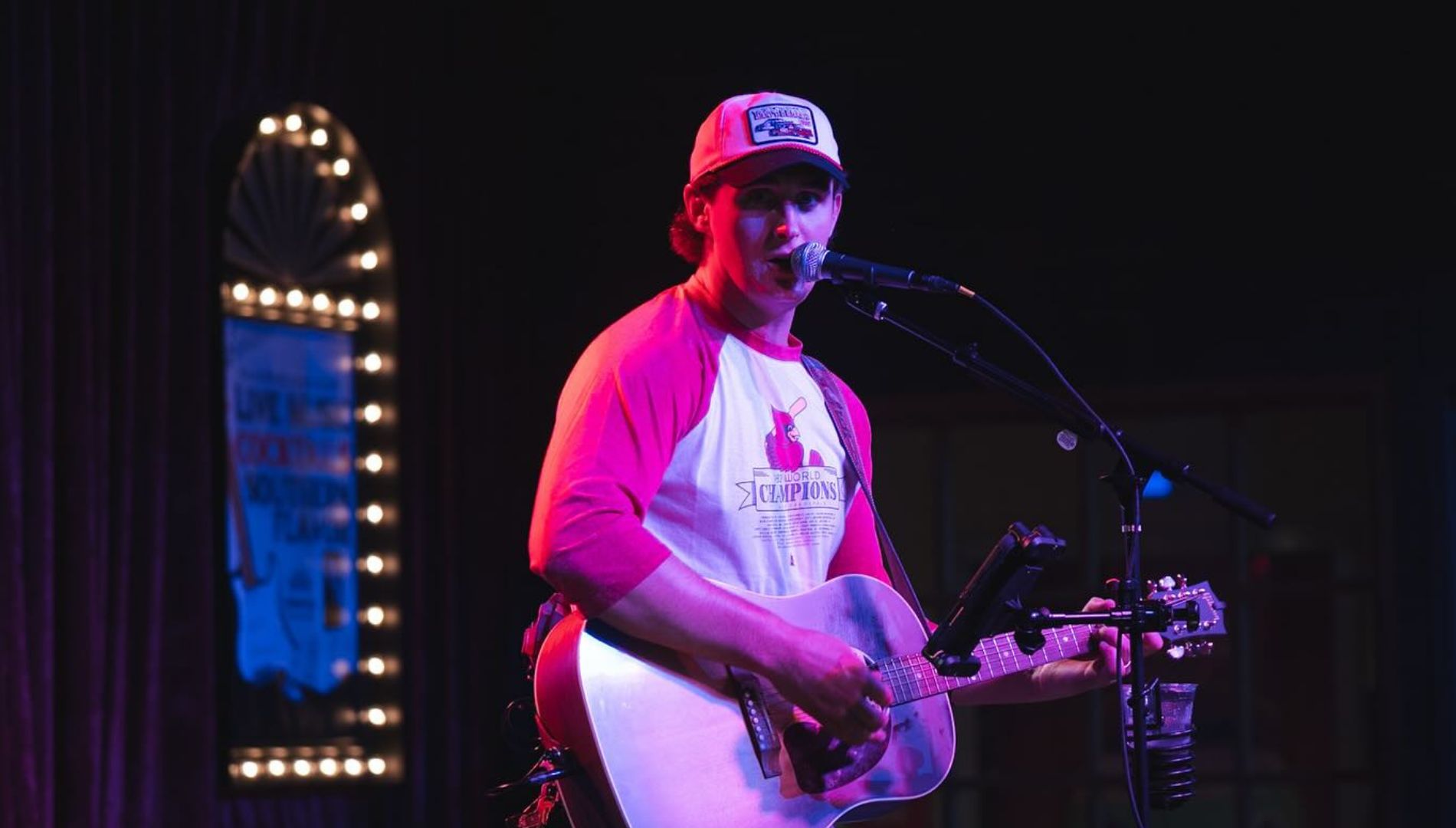 Singer on stage with guitar
