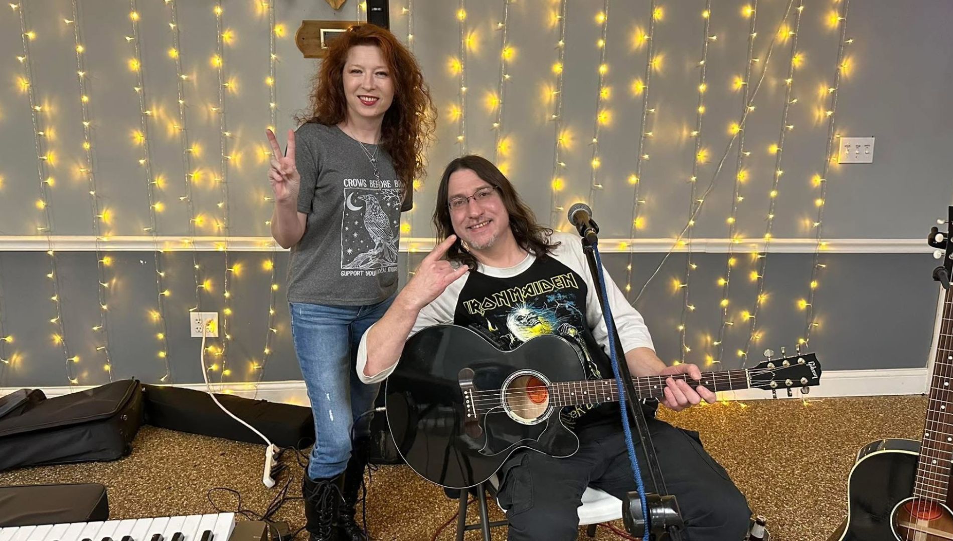 Singers on stage with guitar