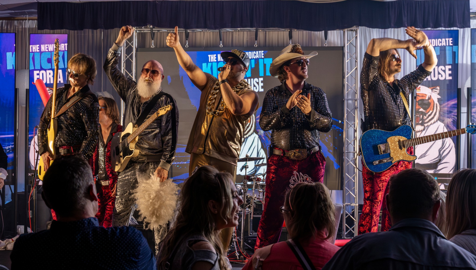 Men performing on stage