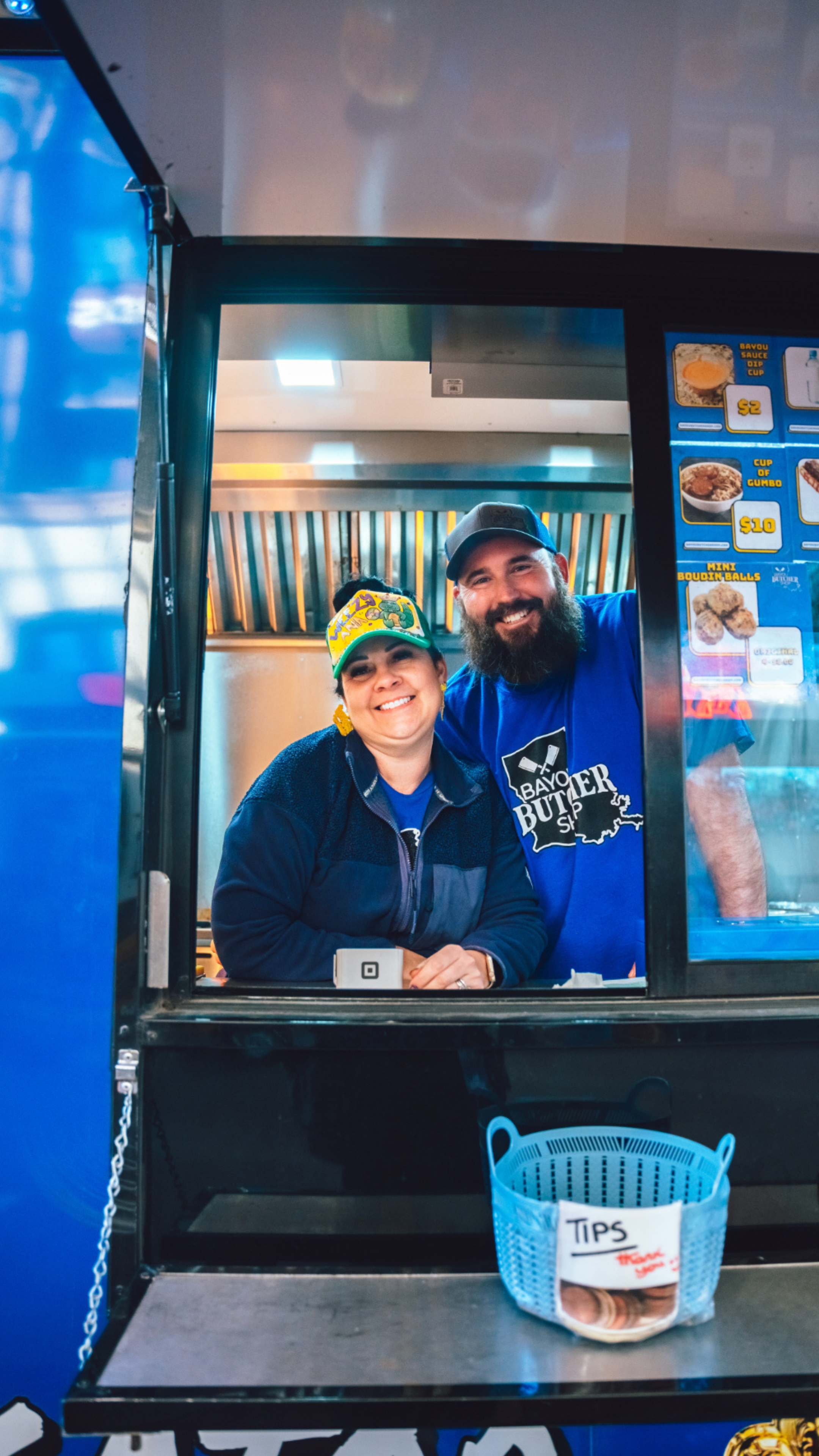 Bayou Butchershop staff posing for a picture in their food truck.