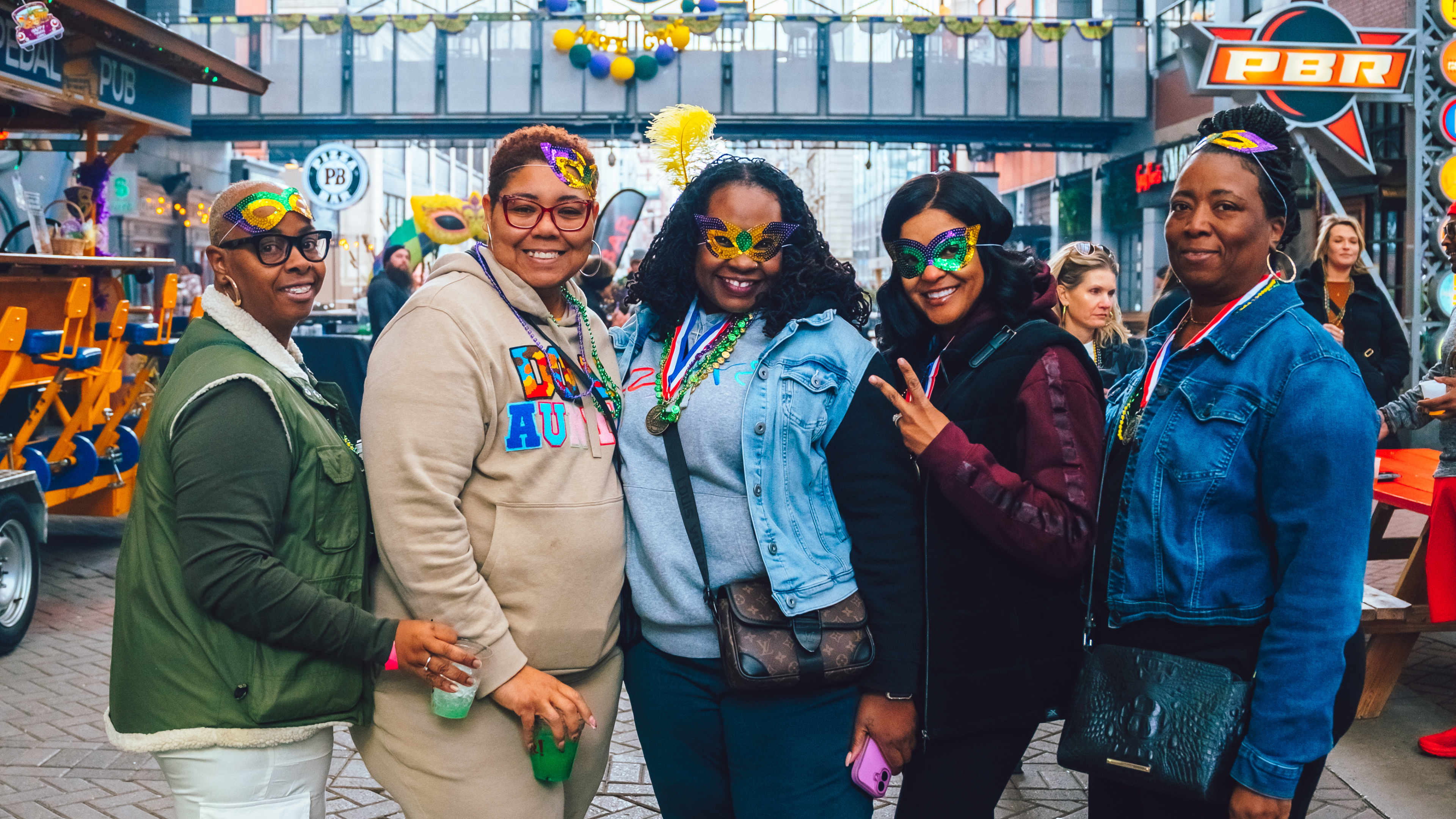 Woman posing for a picture at Mardi Gras Live!