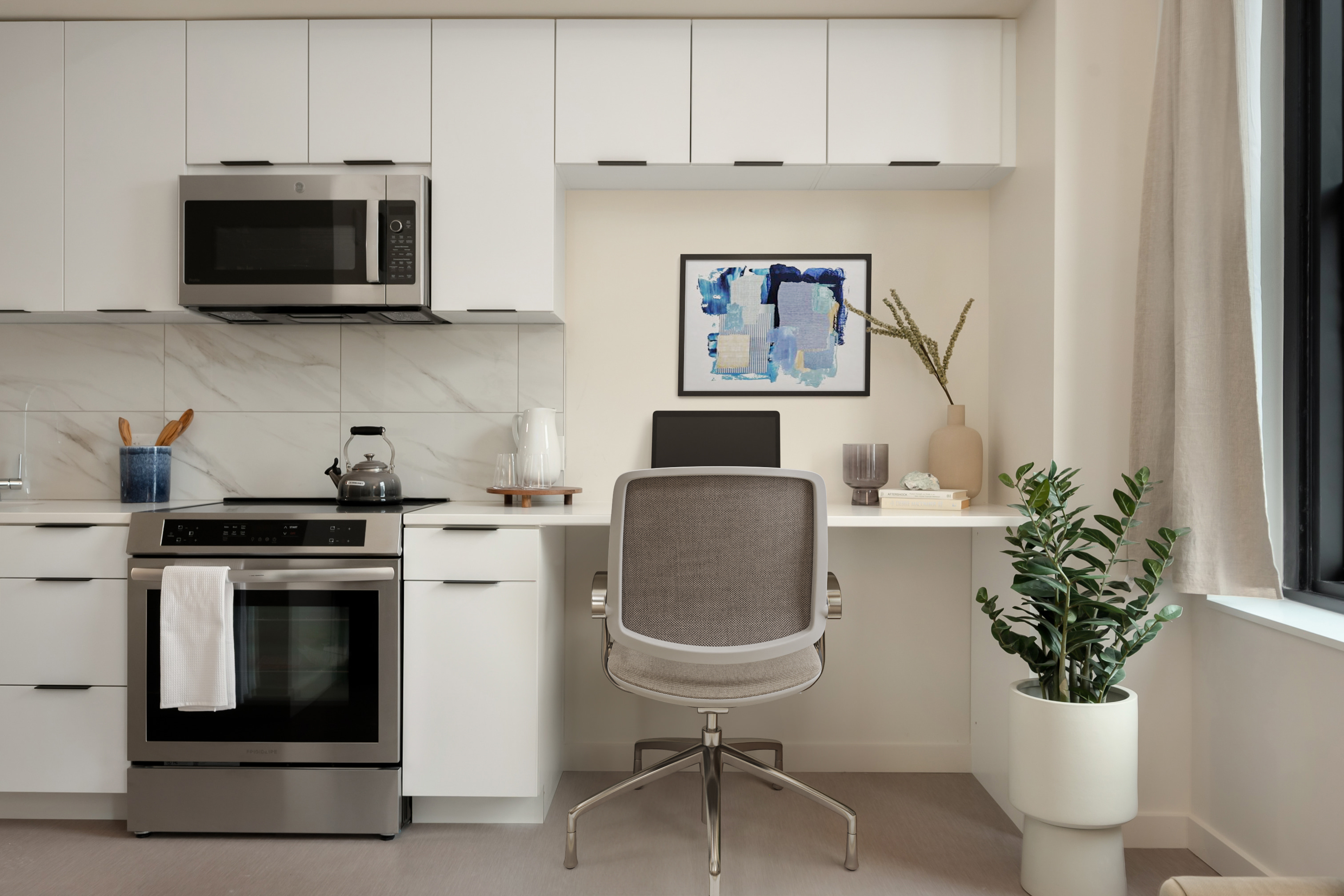 Midland Lofts kitchen and connected desk space.