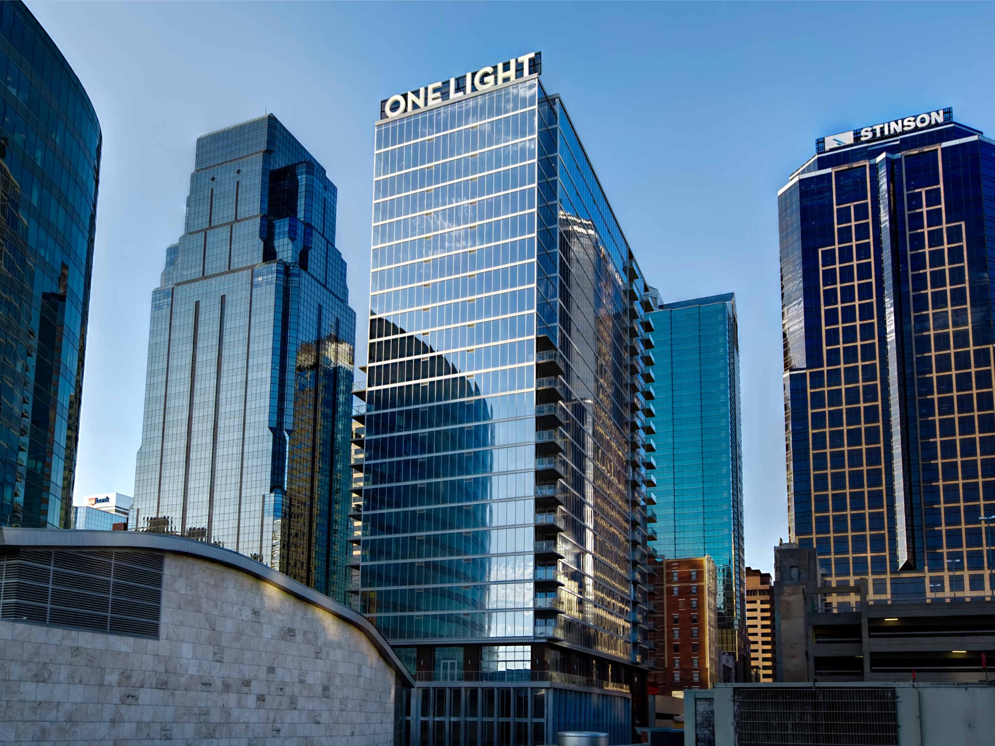 Exterior of One Light building as surrounded by other Kansas City high rises.