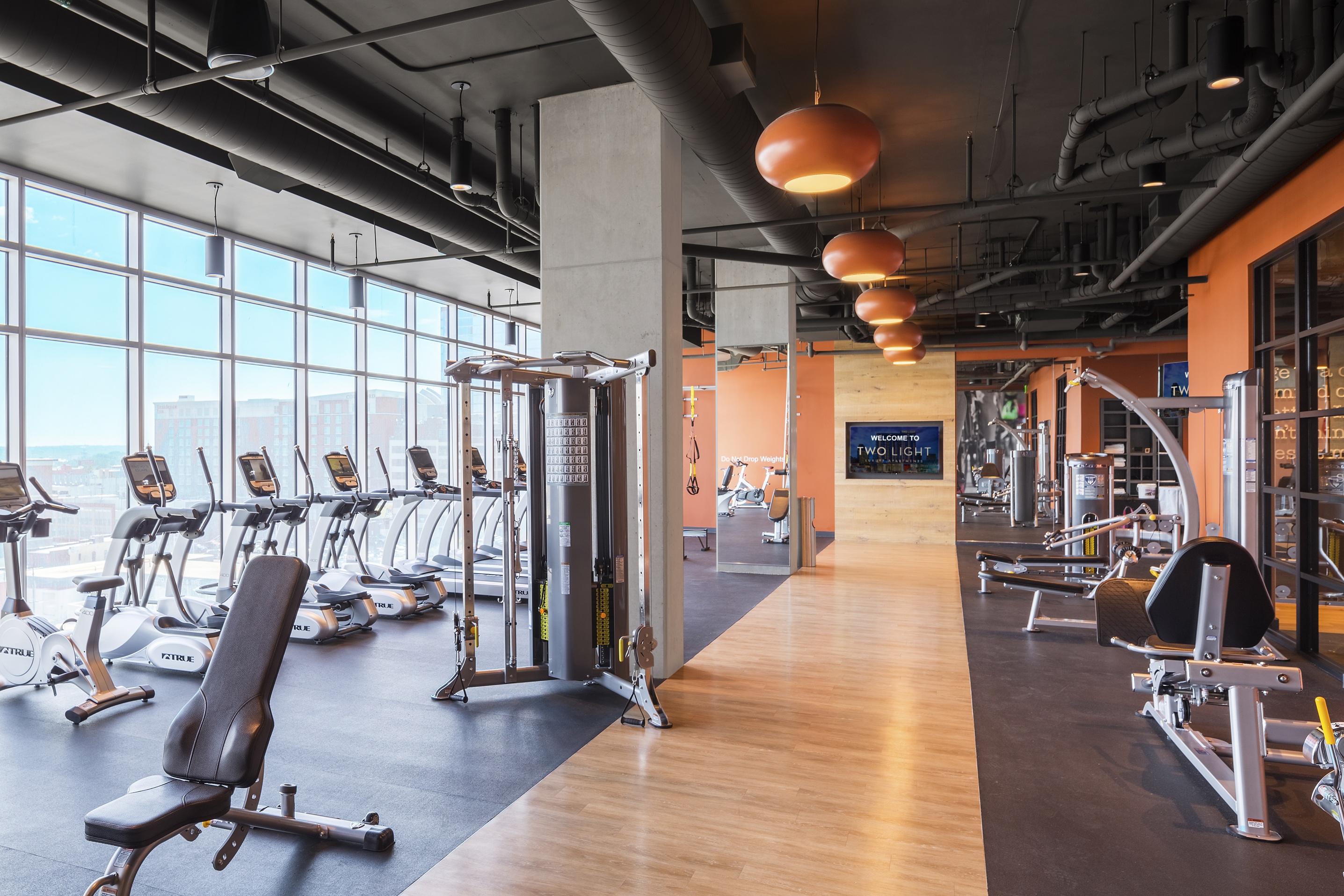 Well-equipped gym at Two Ligh luxury apartments.