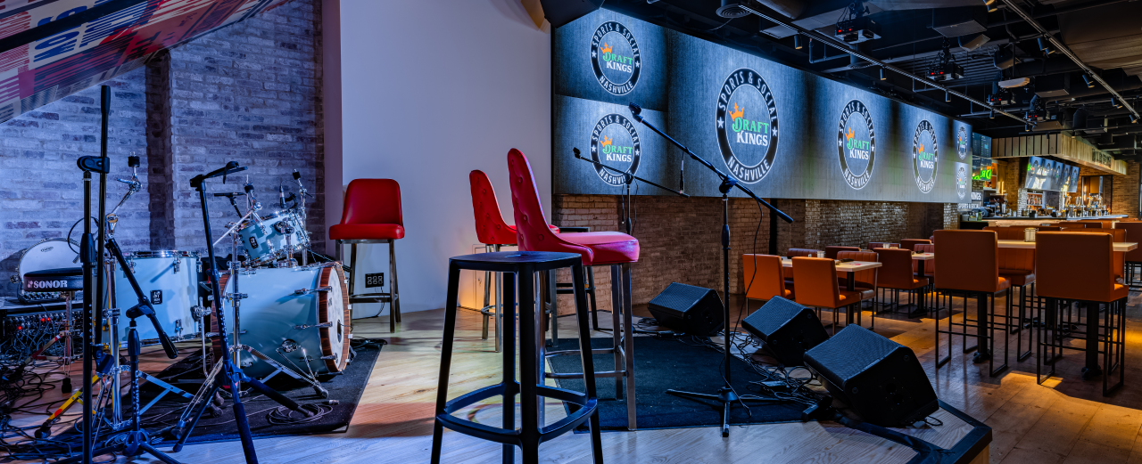 DraftKings Sports & Social main dining area and stage