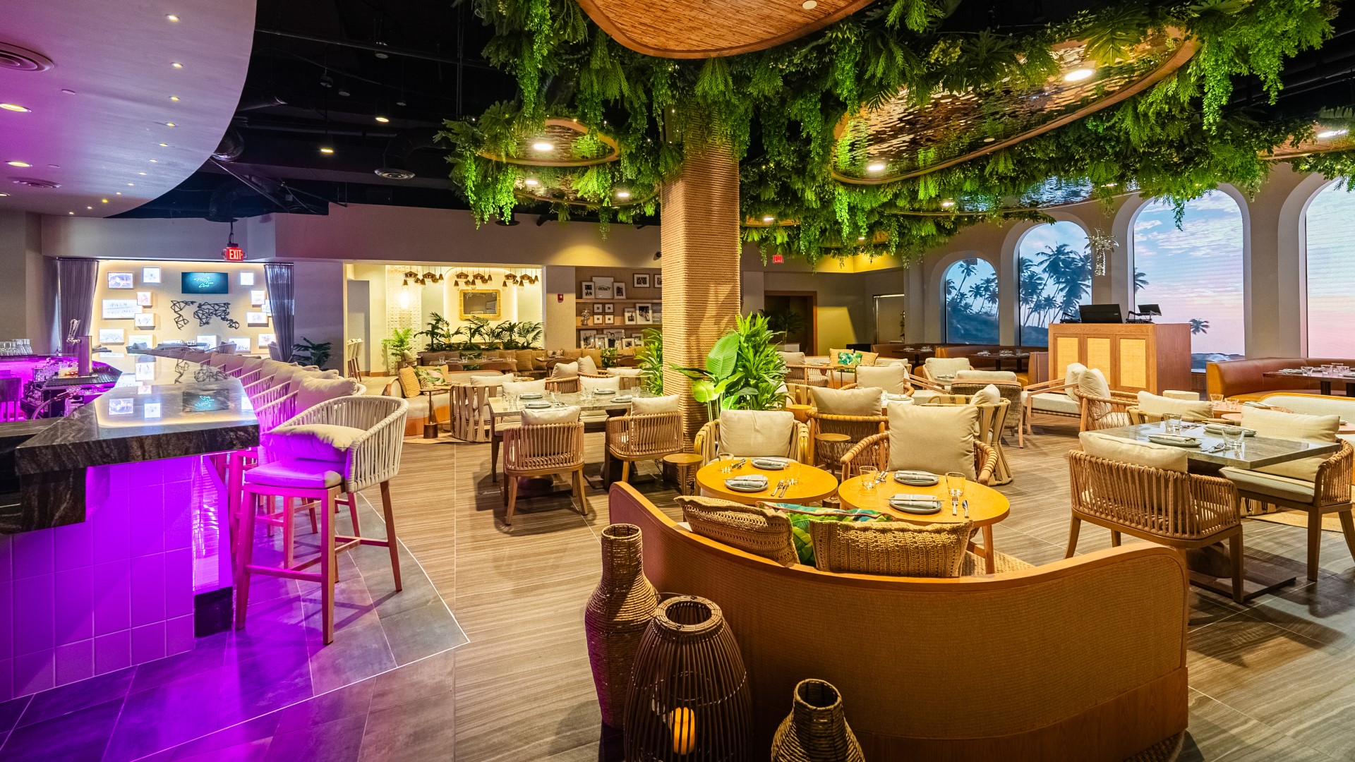 Palm Tree Club white tablecloth dining area and bar in Orlando.