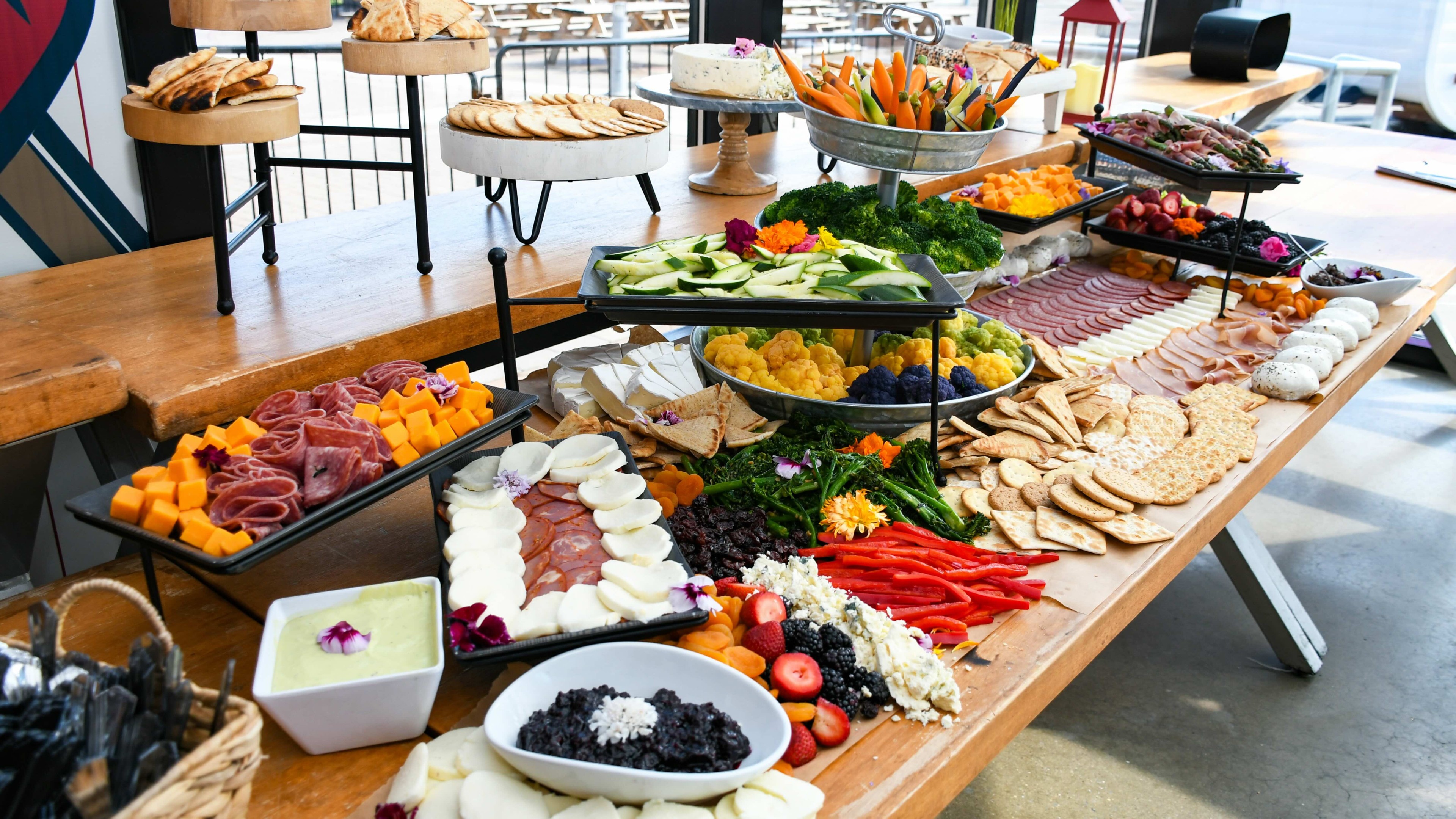 Buffet table of numerous food offerings for event.
