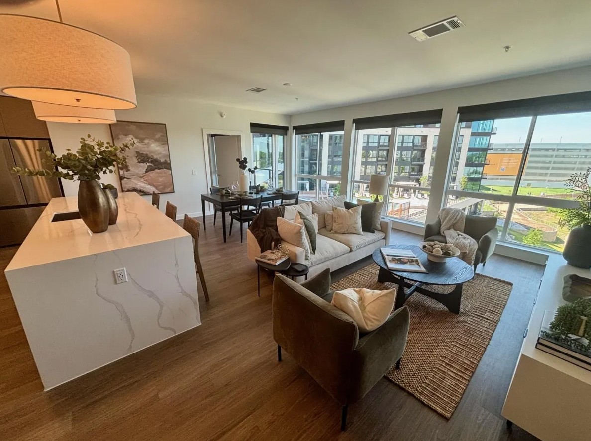 One Rangers Way penthouse living room and dining area.