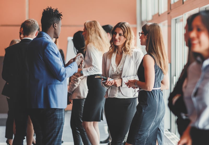 group of business people congregating