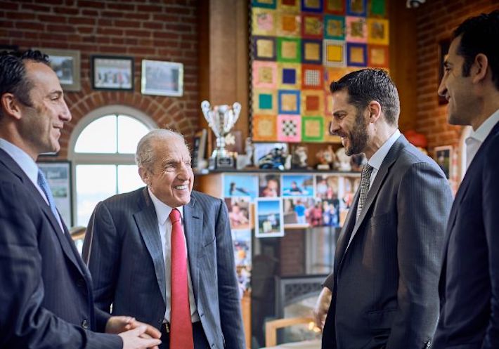 David Cordish, Chairman and CEO, smiles at his sons who are carrying on the fourth generation of family ownership.