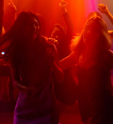 image of girls dancing in a nightclub
